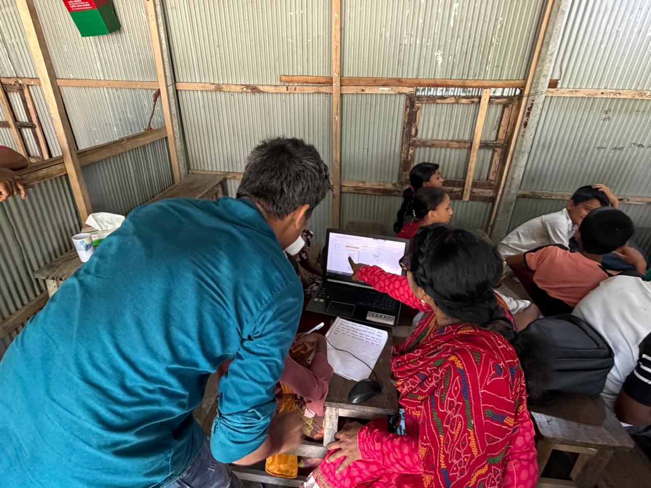 A teacher guiding a small group of students